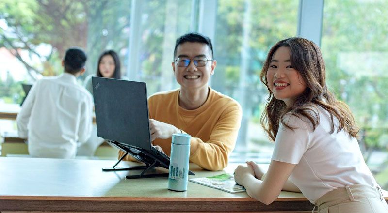 Students smiling to the camera